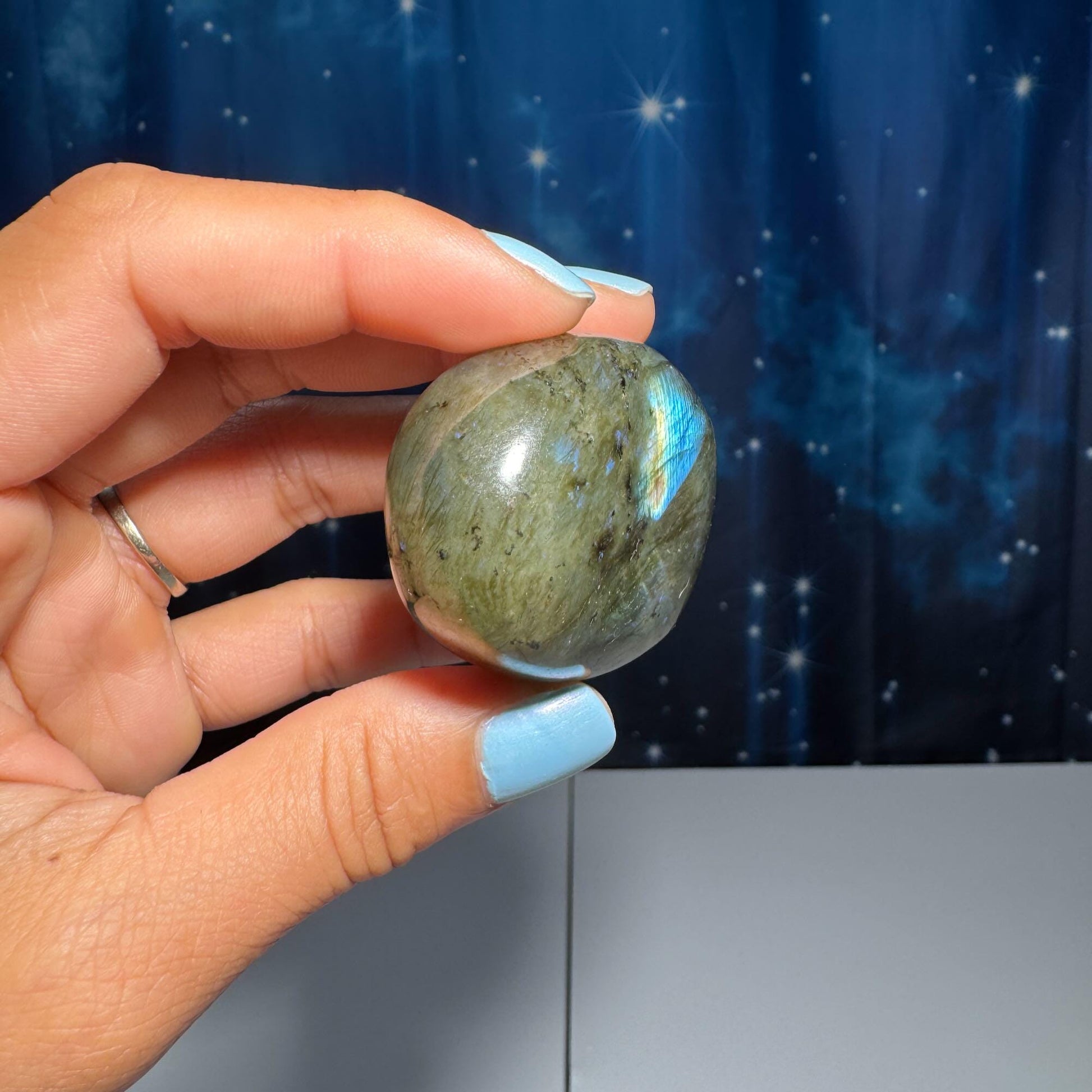 Labradorite palm stone | 1 7/8” long | 76 grams | blue flash | yellow flash | silver flash | orange flash