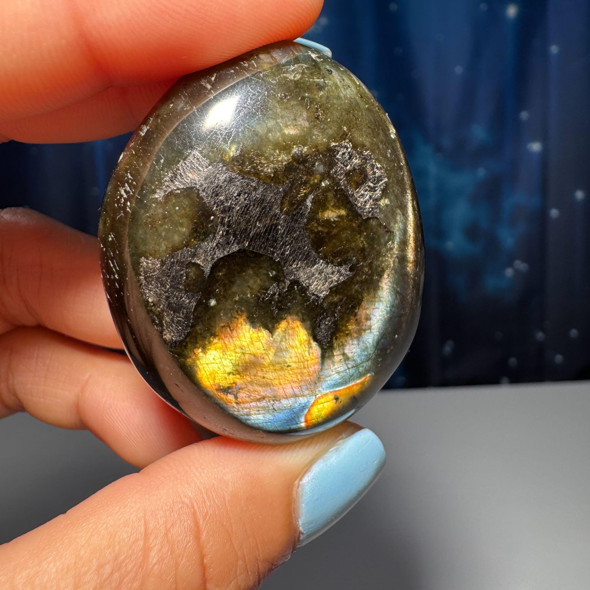 Flashy Labradorite palm stone | 1 7/8” long | 57 grams | orange flash | blue flash | silver flash | pink flash | rainbow