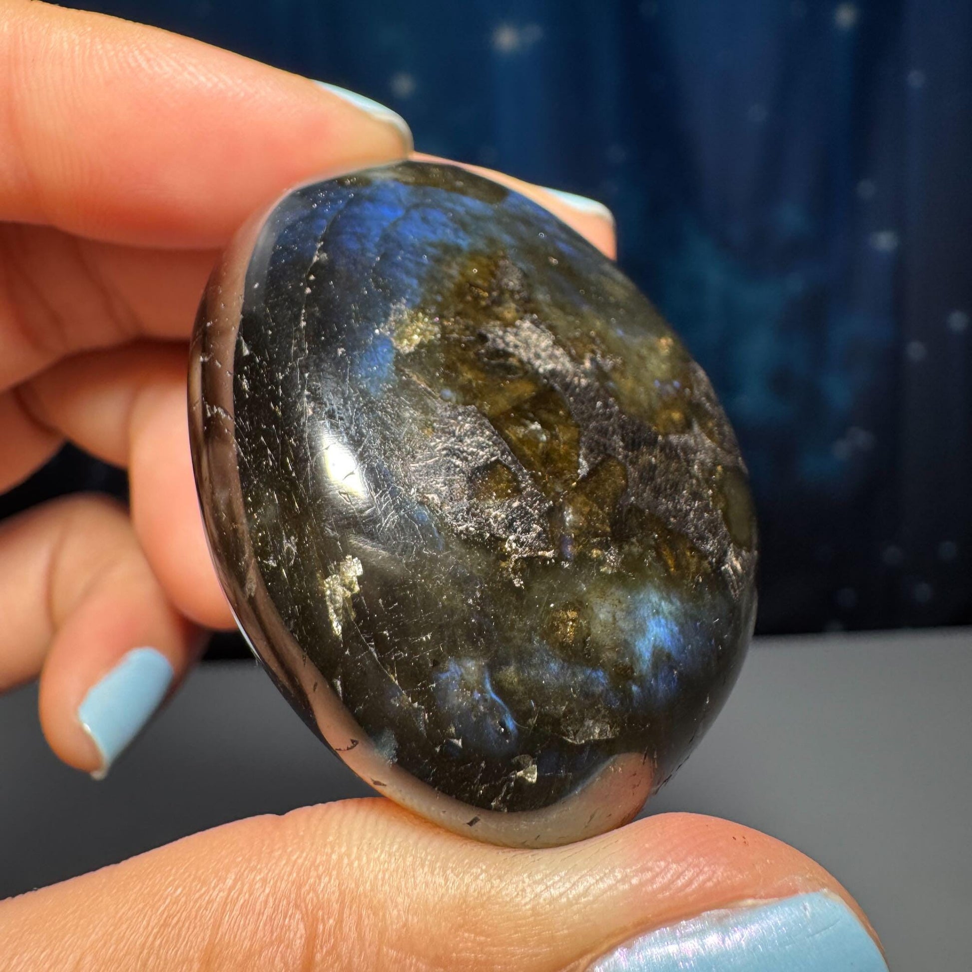Flashy Labradorite palm stone | 1 7/8” long | 57 grams | orange flash | blue flash | silver flash | pink flash | rainbow