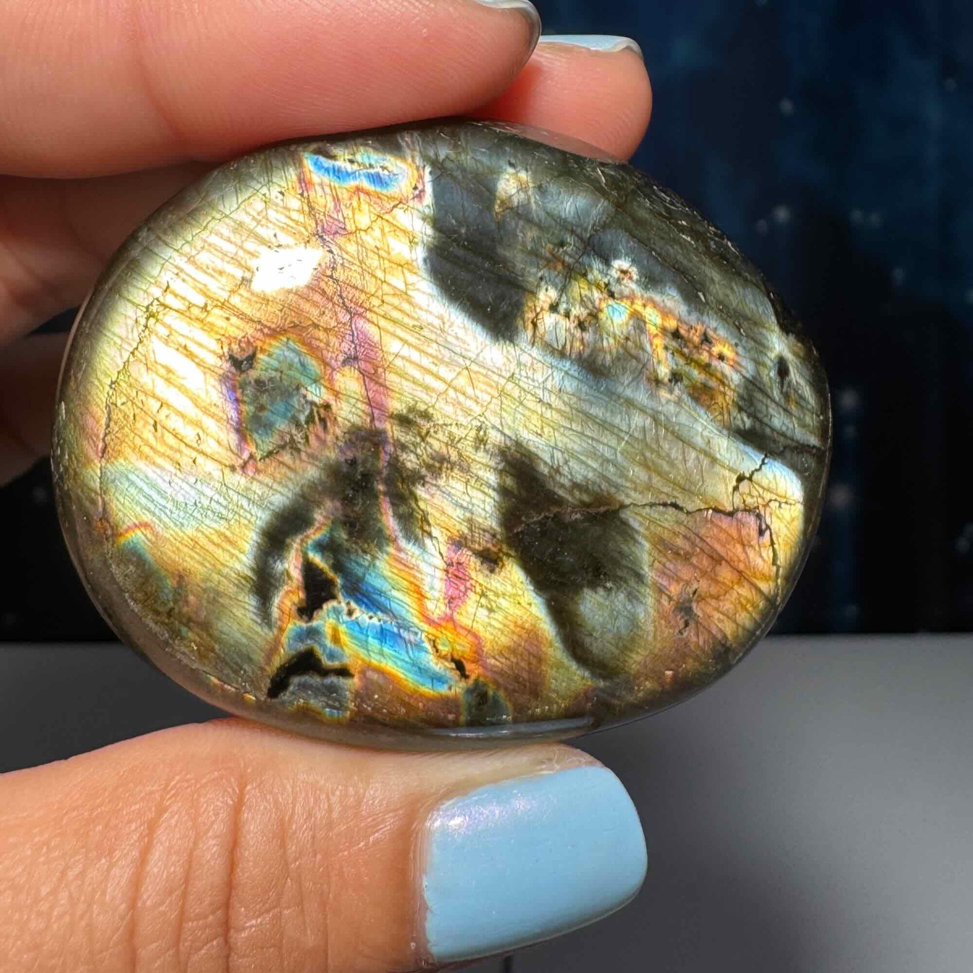 Flashy Labradorite palm stone | 2 1/8” long | 70 grams | silver flash | orange flash | blue flash | yellow flash | pink flash | purple flash