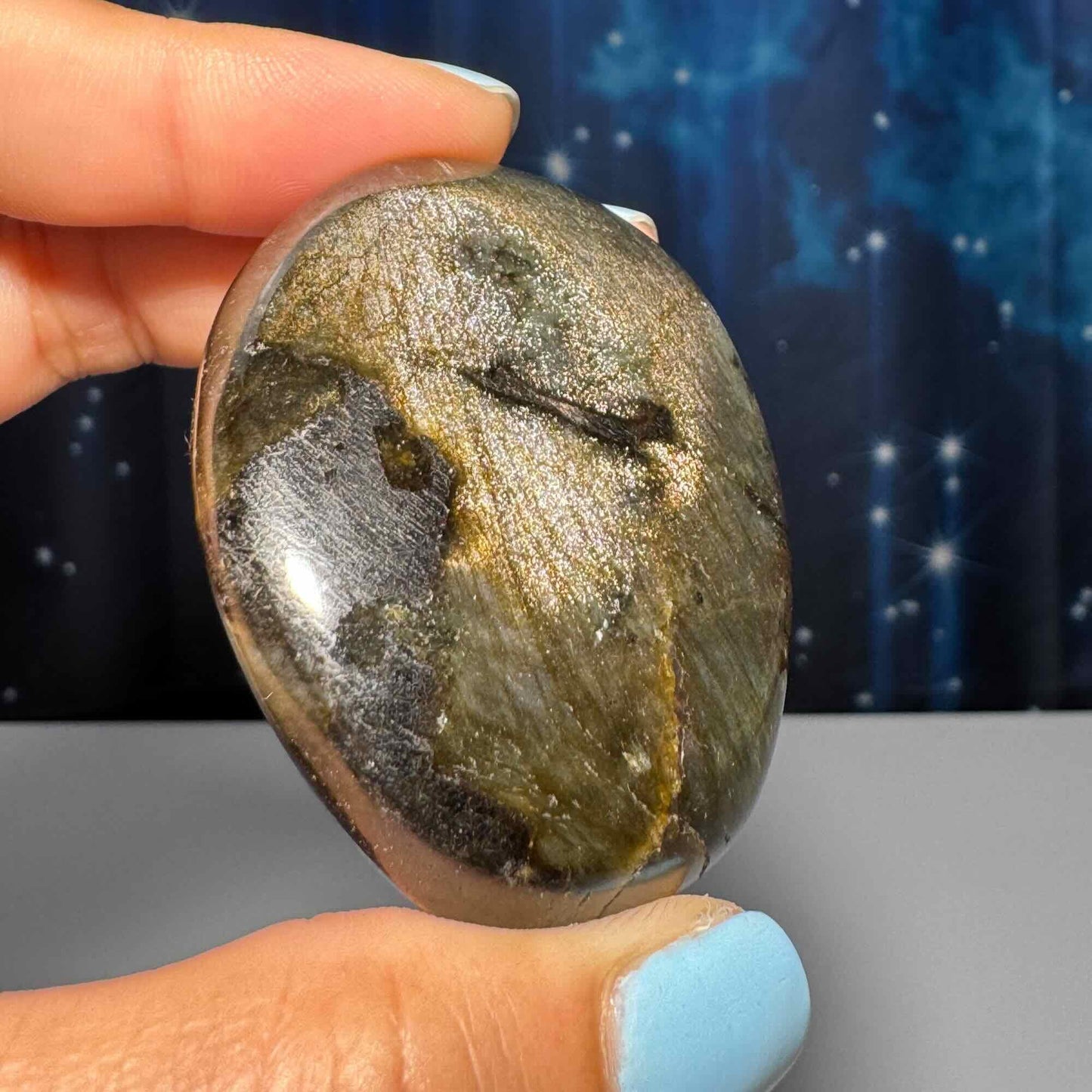 Flashy Labradorite palm stone | 2 1/8” long | 70 grams | silver flash | orange flash | blue flash | yellow flash | pink flash | purple flash
