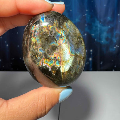 Flashy Labradorite palm stone | 2 1/2” long | 130 grams | silver flash | blue flash | orange flash | purple flash