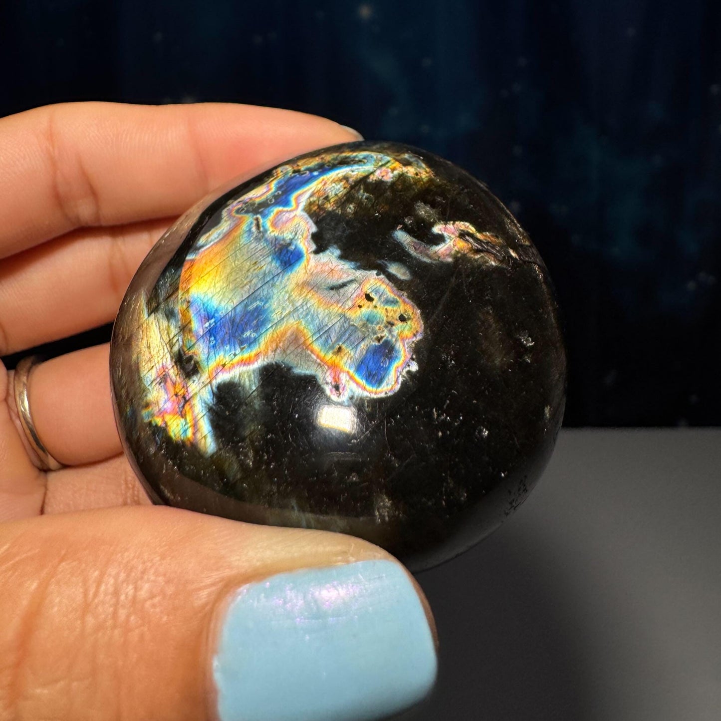 Flashy Labradorite palm stone | 2 1/2” long | 130 grams | silver flash | blue flash | orange flash | purple flash