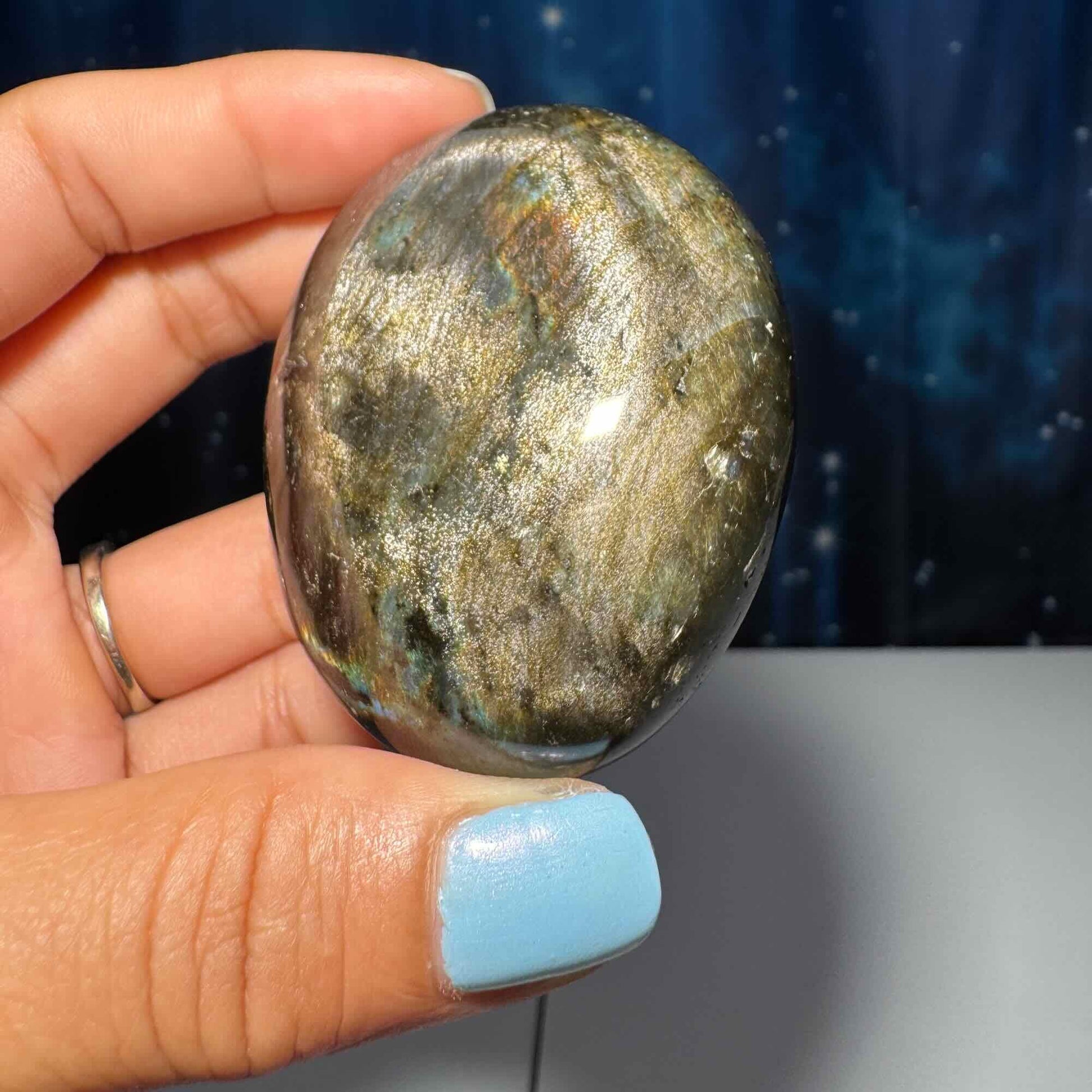 Flashy Labradorite palm stone | 2 1/2” long | 130 grams | silver flash | blue flash | orange flash | purple flash