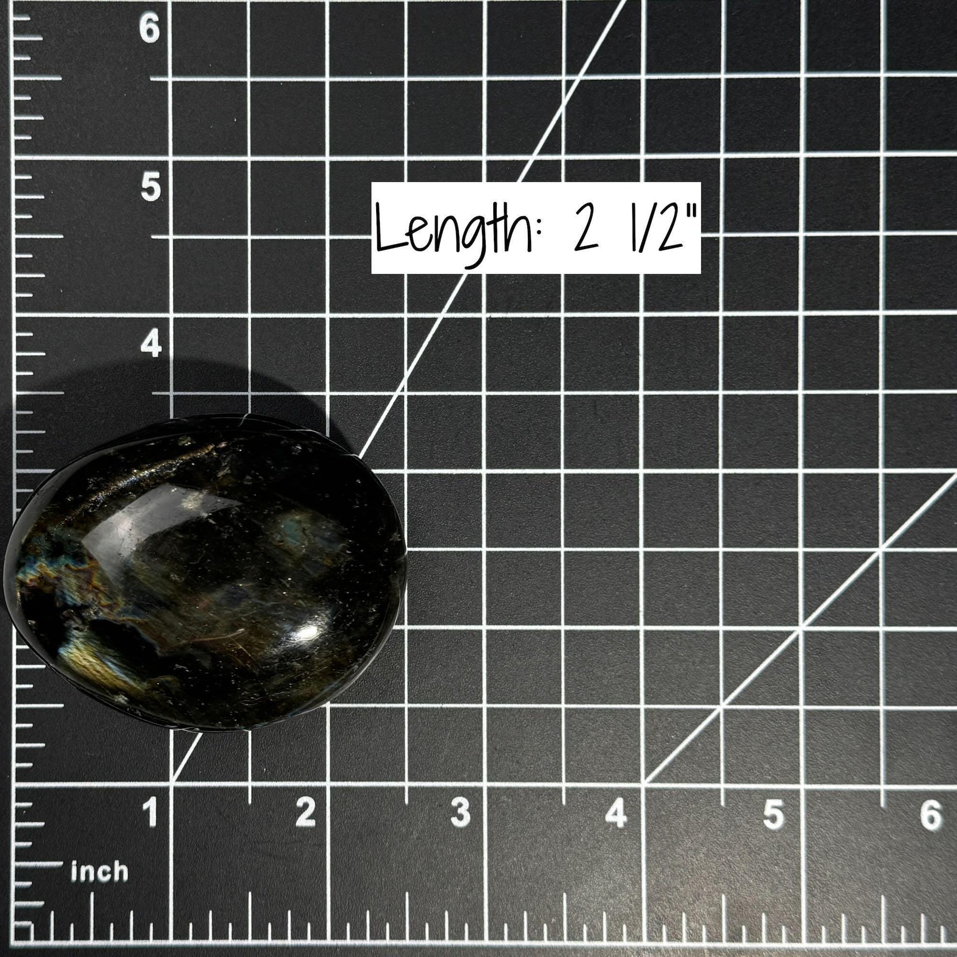 Flashy Labradorite palm stone | 2 1/2” long | 130 grams | silver flash | blue flash | orange flash | purple flash