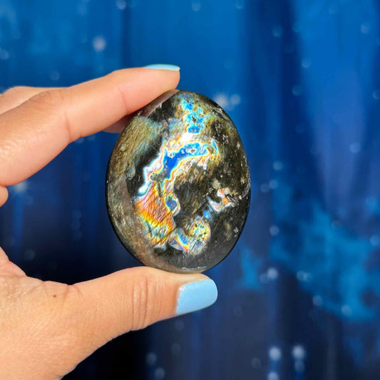 Flashy Labradorite palm stone | 2 1/2” long | 130 grams | silver flash | blue flash | orange flash | purple flash