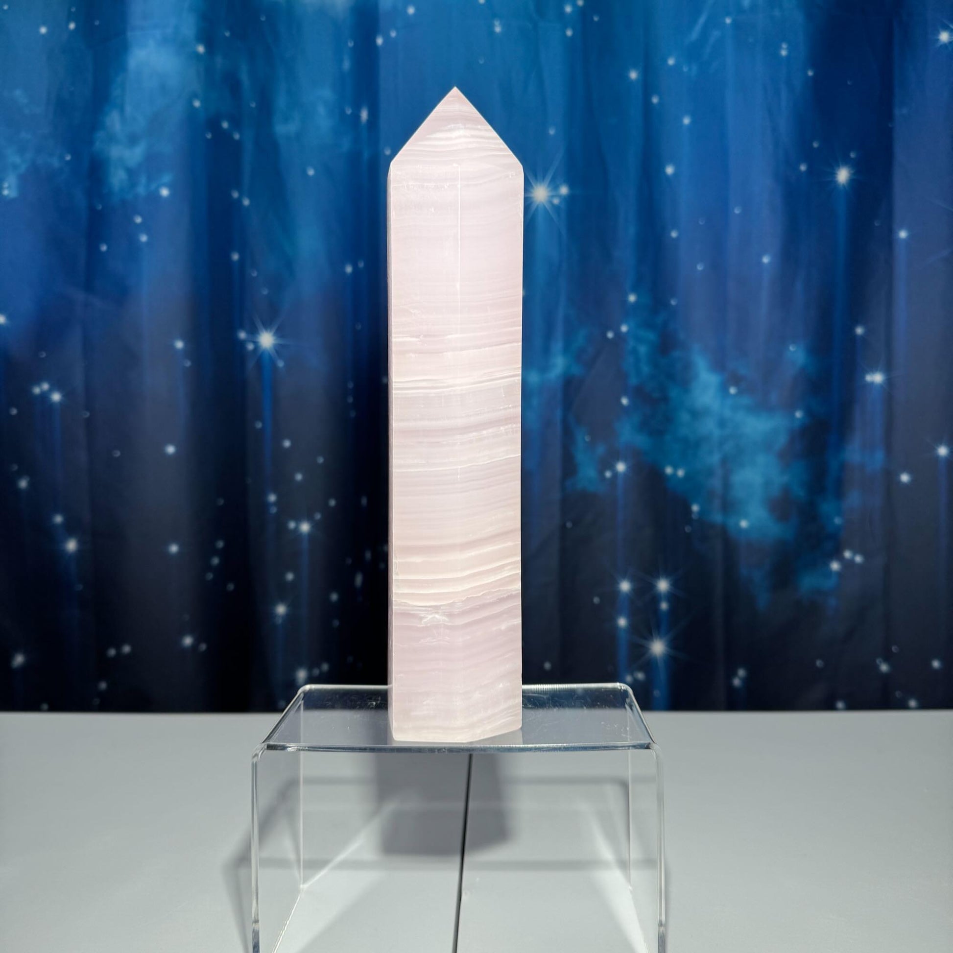 XL pink Mangano Calcite tower | 9 5/8” tall | 1.443 kilograms | Damage Discount | UV reactive | pink Banded Calcite tower