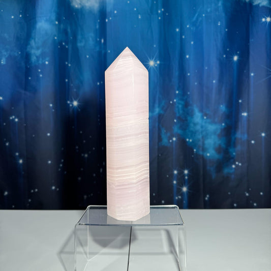 XL pink Mangano Calcite tower | 9 5/8” tall | 1.443 kilograms | Damage Discount | UV reactive | pink Banded Calcite tower