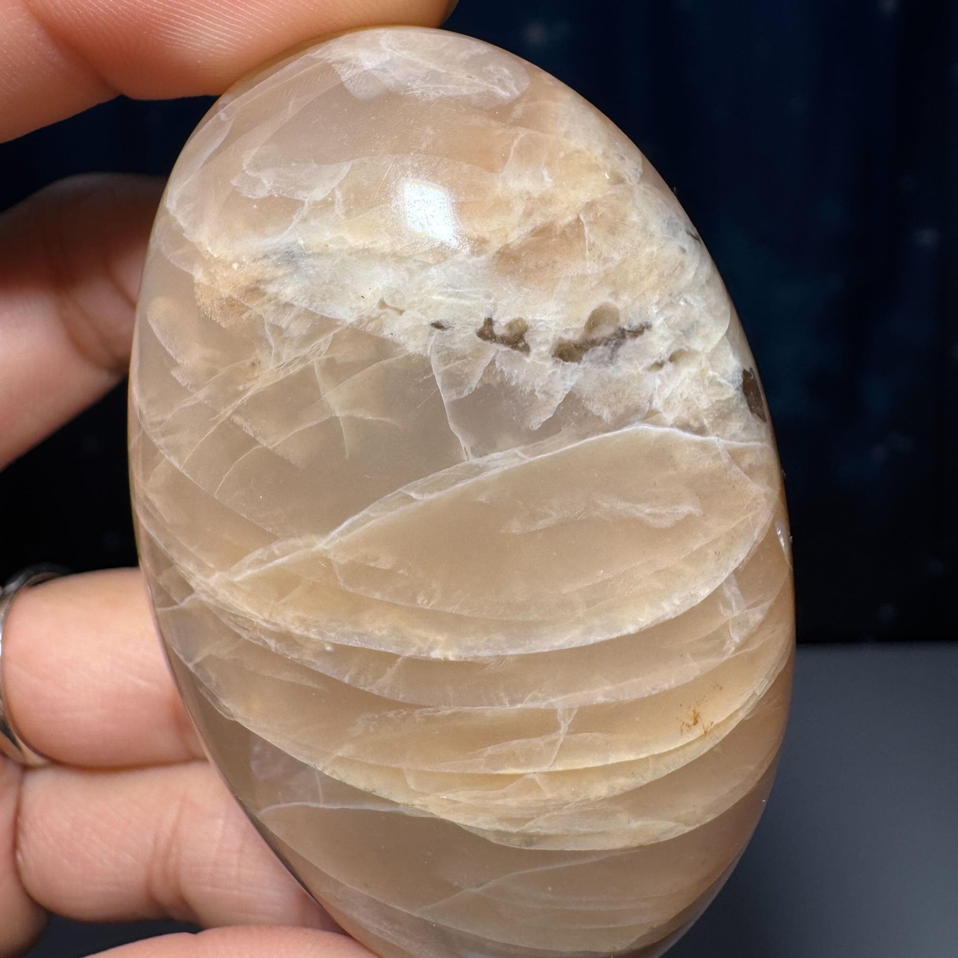 Flashy Peach Moonstone palm stone | 2 5/8" long | 113 grams | dual flash | Sunstone inclusion | Smoky Quartz inclusion