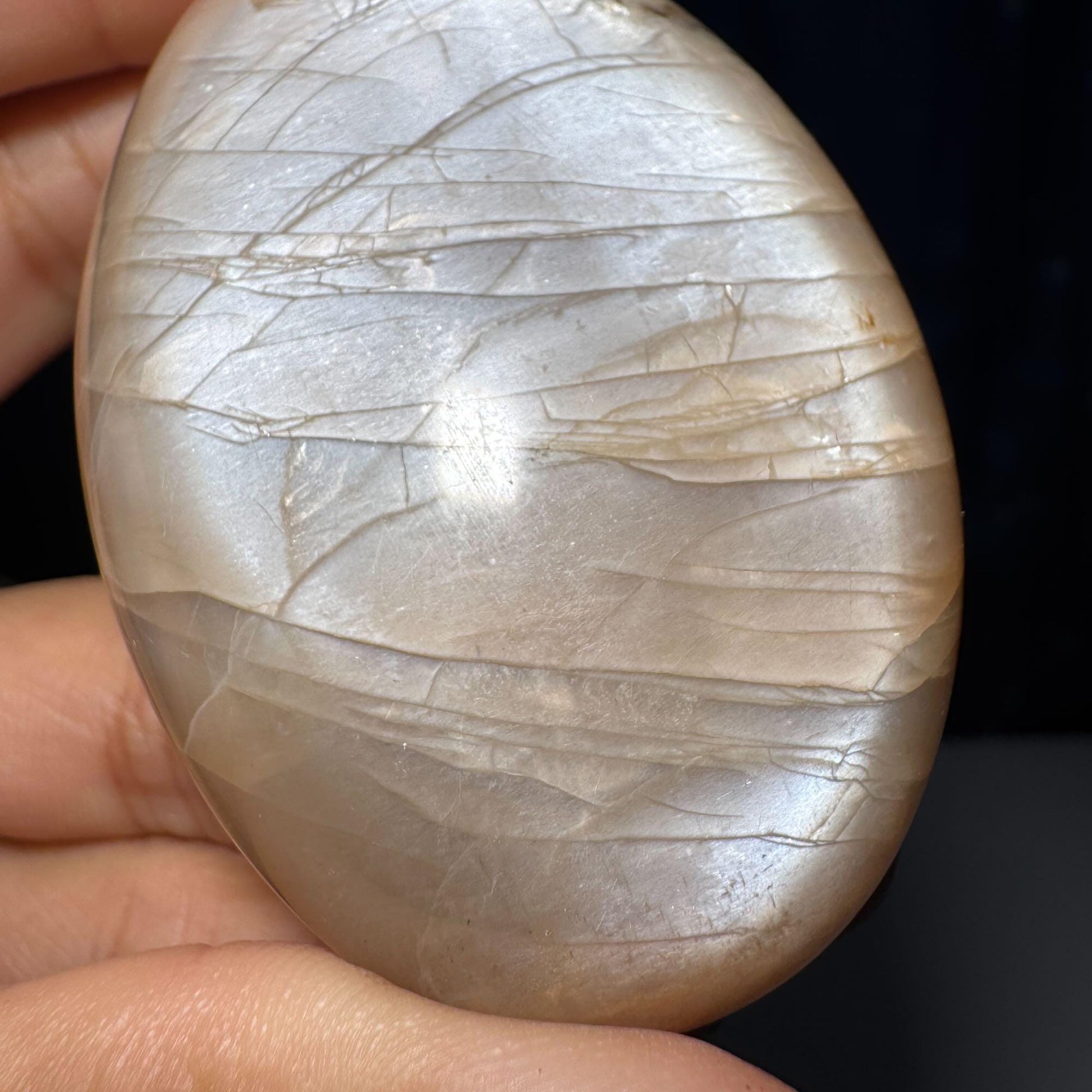 Flashy Peach Moonstone palm stone | 2 5/8" long | 113 grams | dual flash | Sunstone inclusion | Smoky Quartz inclusion