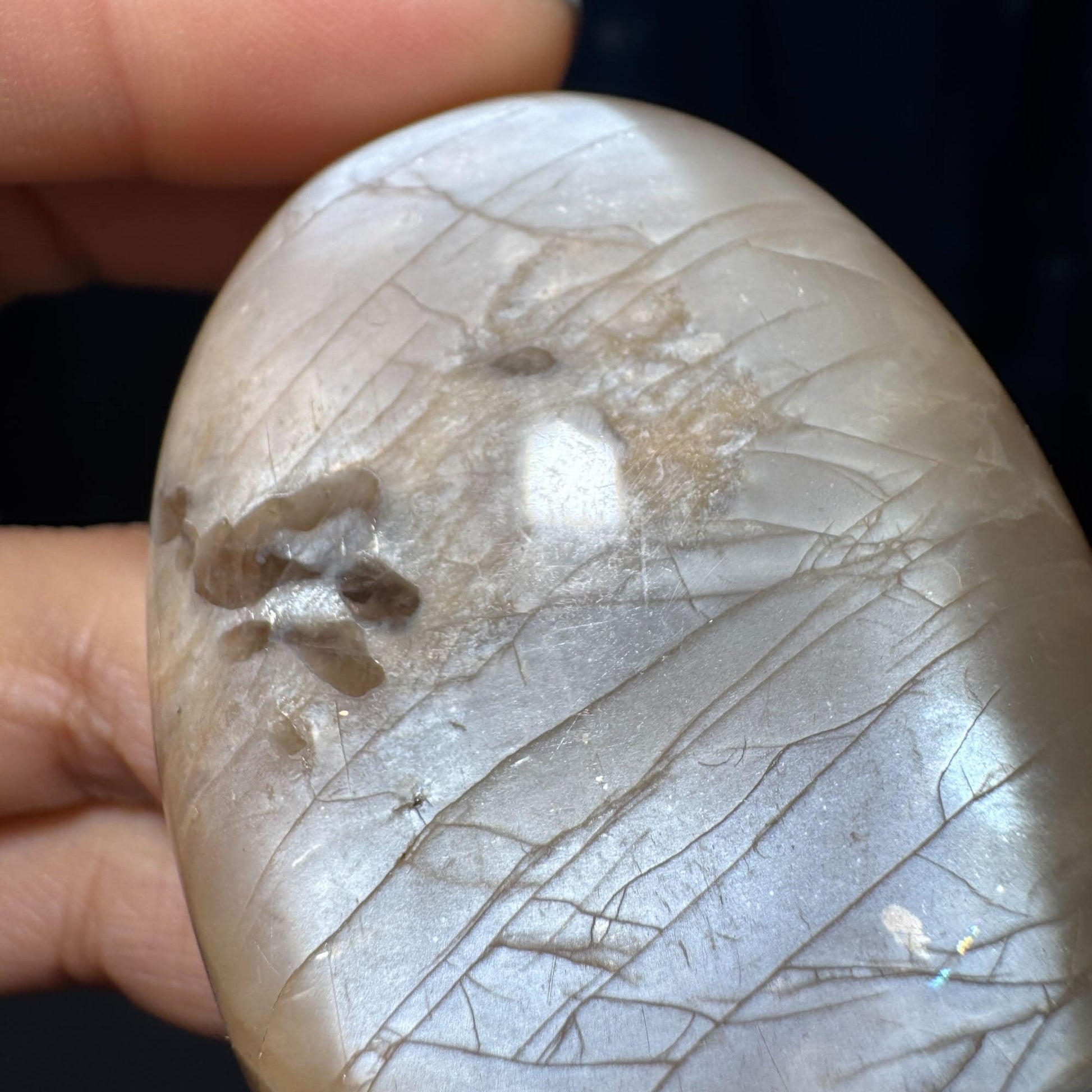 Flashy Peach Moonstone palm stone | 2 5/8" long | 113 grams | dual flash | Sunstone inclusion | Smoky Quartz inclusion