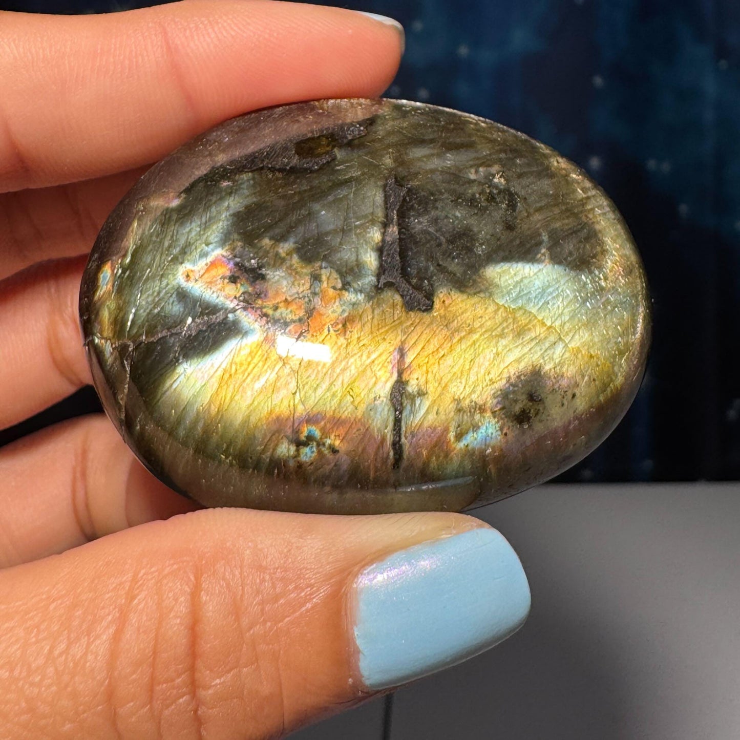 Flashy Labradorite palm stone | 2 1/8” long | 70 grams | silver flash | orange flash | blue flash | yellow flash | pink flash | purple flash