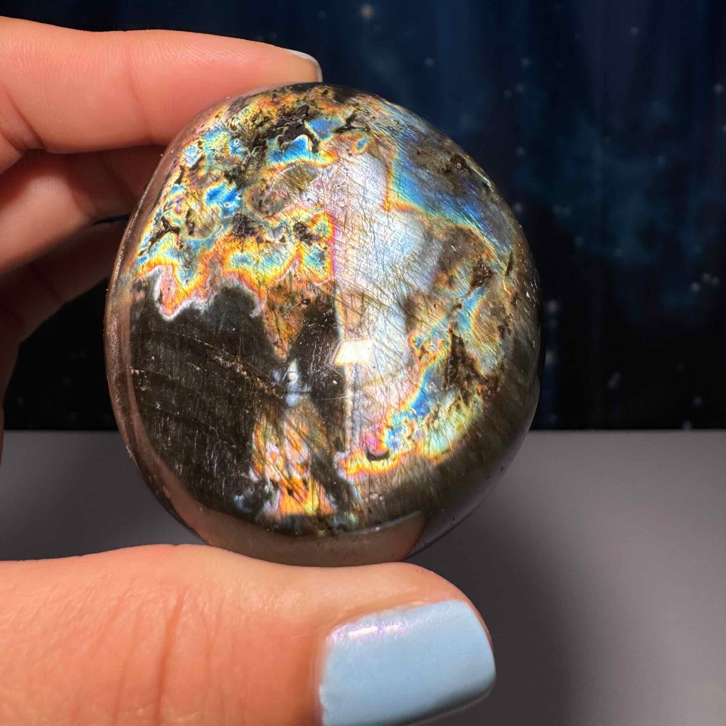 Flashy Labradorite palm stone | 2 1/2” long | 130 grams | silver flash | blue flash | orange flash | purple flash
