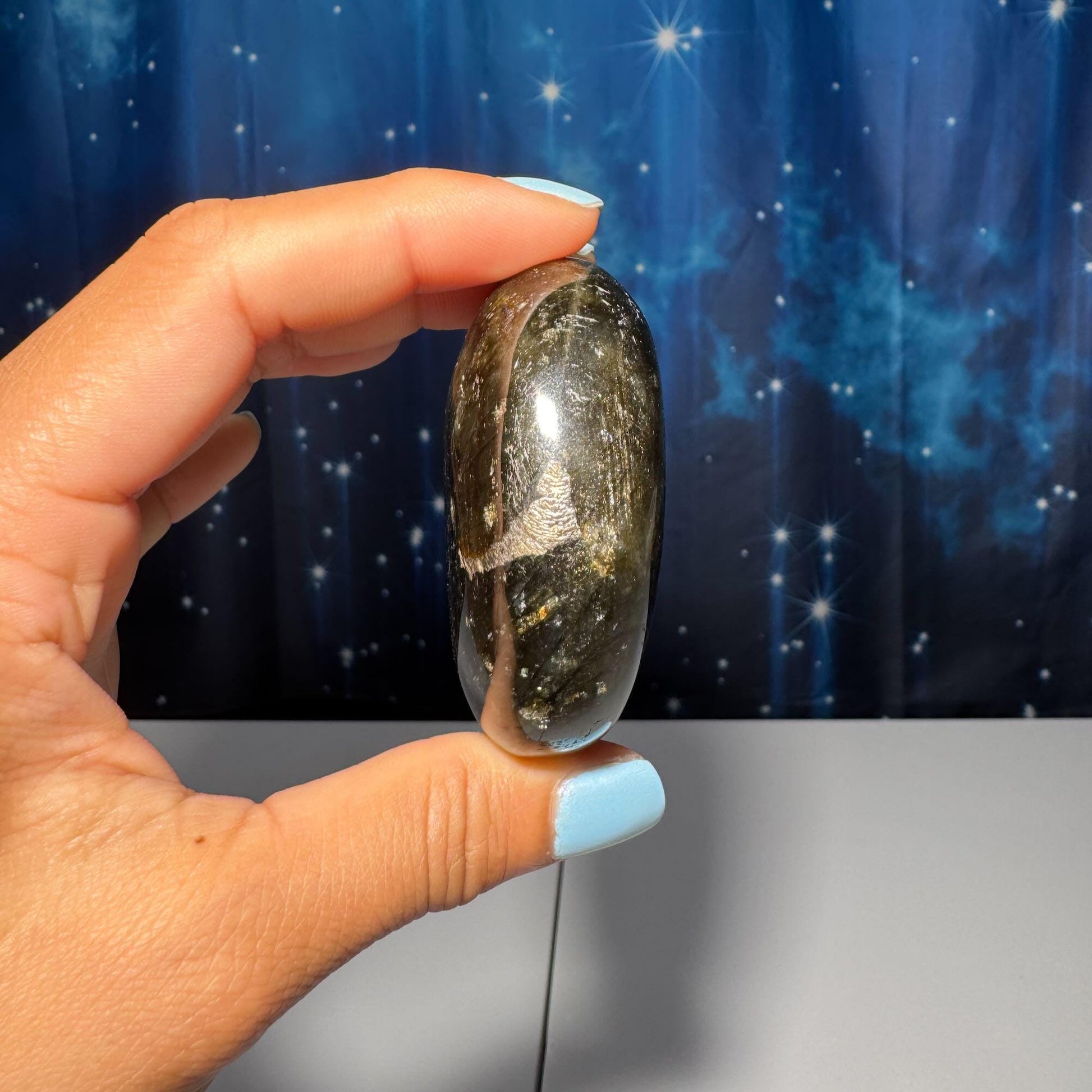 Flashy Labradorite palm stone | 2 1/2” long | 130 grams | silver flash | blue flash | orange flash | purple flash