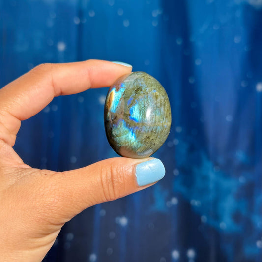 Labradorite palm stone | 1 7/8” long | 76 grams | blue flash | yellow flash | silver flash | orange flash