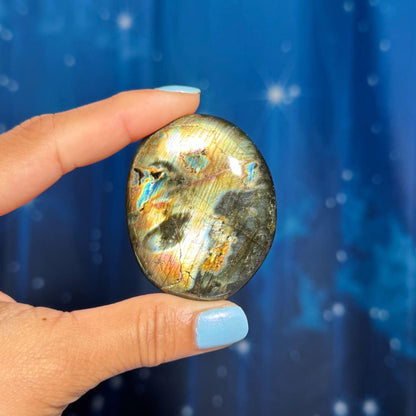 Flashy Labradorite palm stone | 2 1/8” long | 70 grams | silver flash | orange flash | blue flash | yellow flash | pink flash | purple flash